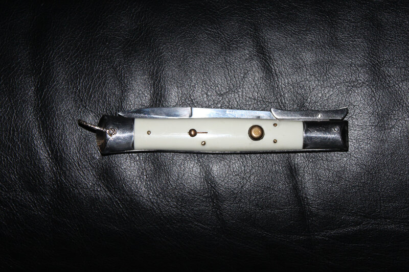 Folding Knife on Leather