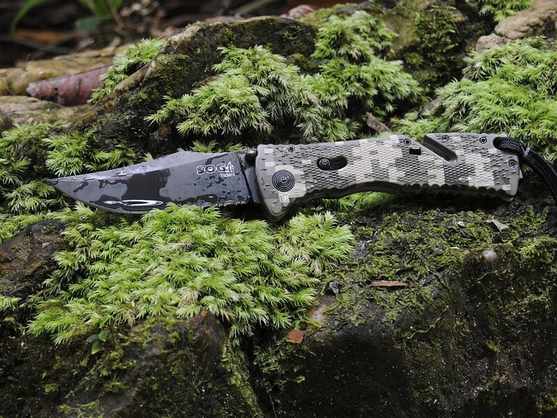 Folding Knife on Moss