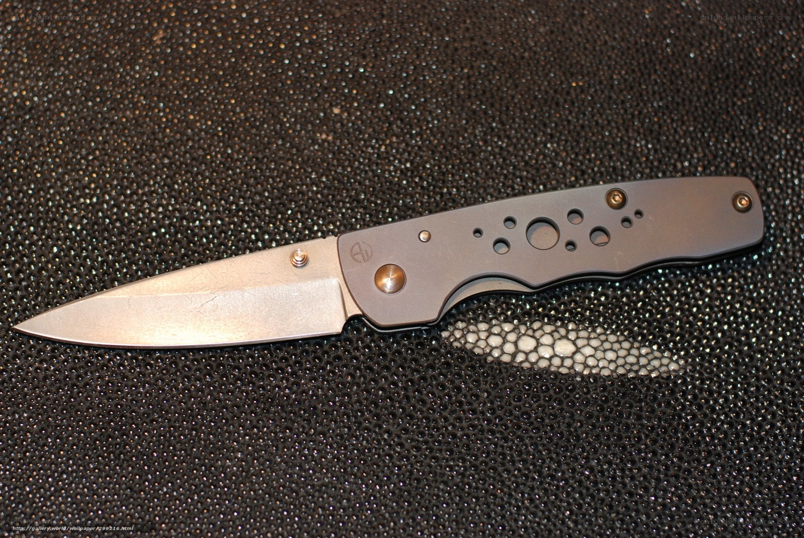 folding knife on textured surface