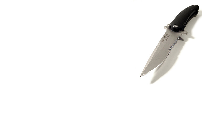 folding knife on white background