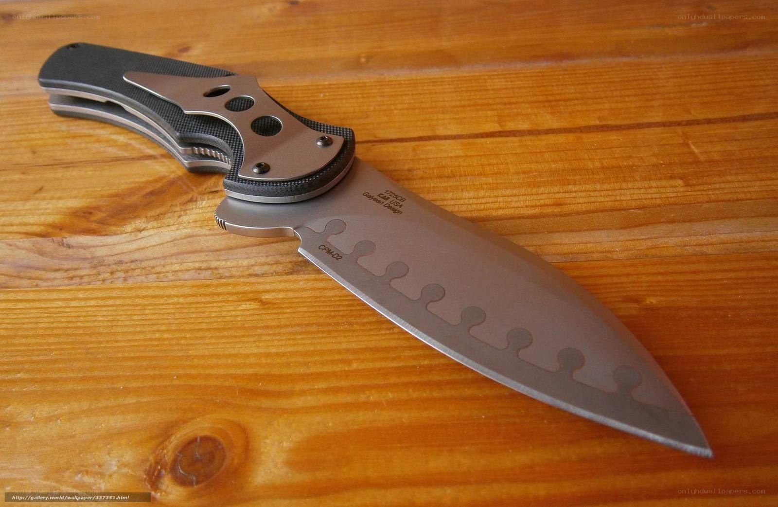 folding knife on wood