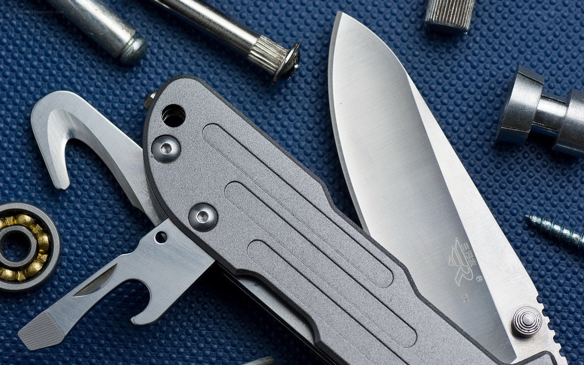 folding knife with tools