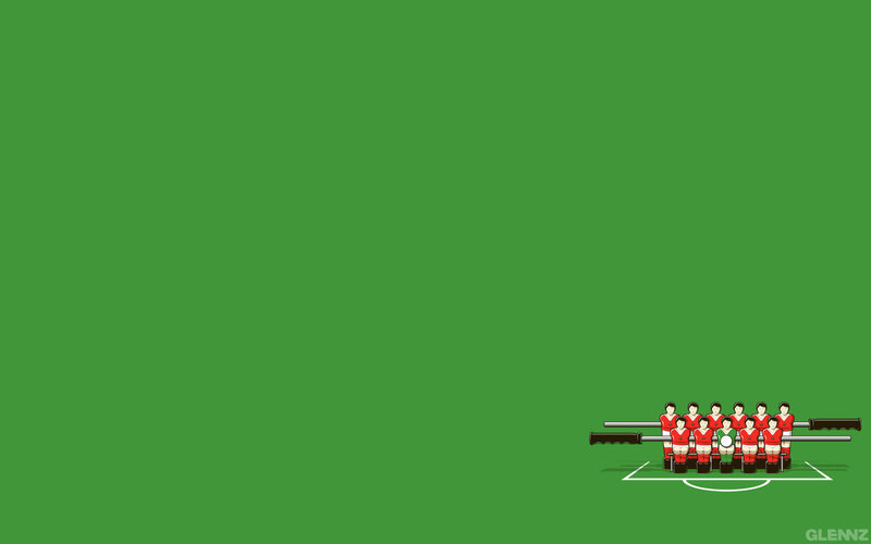 foosball team on green field