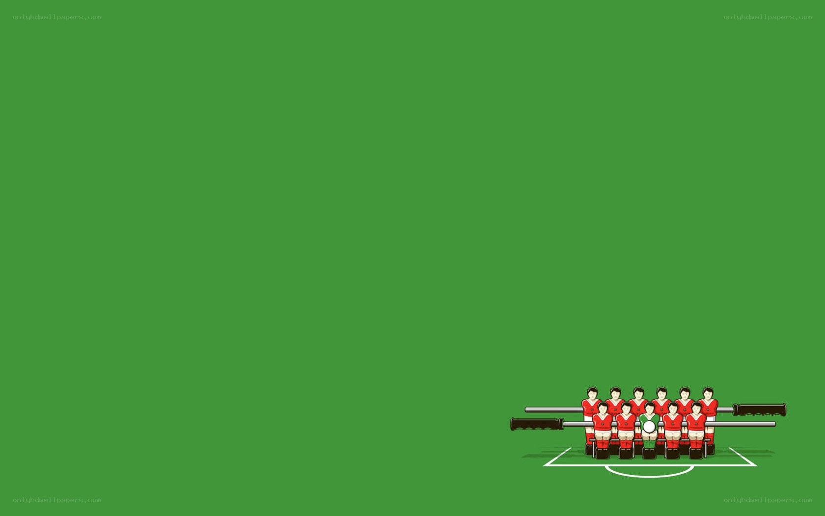 foosball team on green field