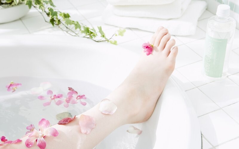 foot bath with flower petals