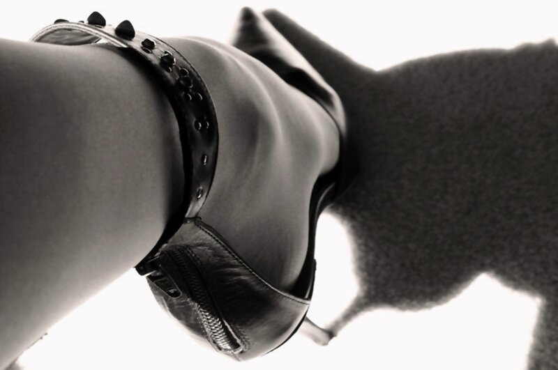 Foot in High-heeled Boot — Black