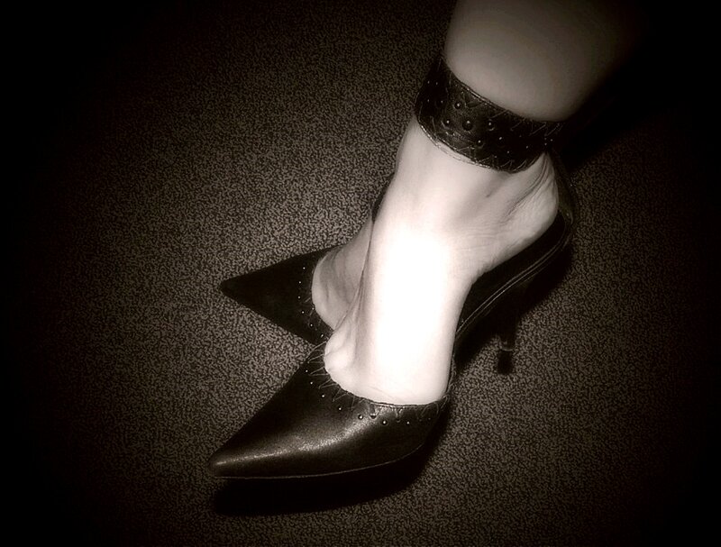 Foot in High-heeled Shoe — Black, Dramatic, Photograph