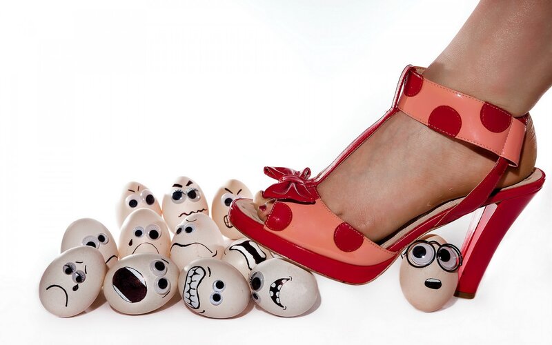 Foot in High-heeled Shoe — Red