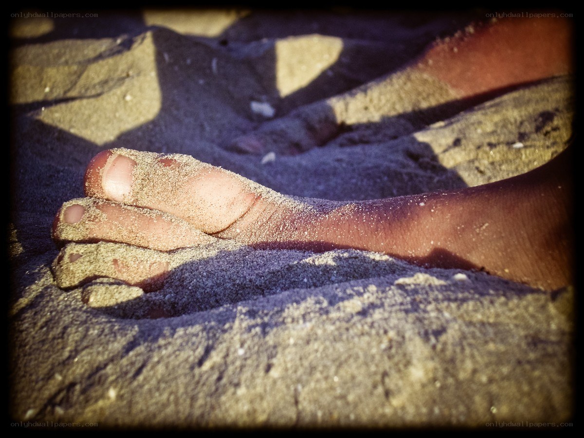 foot in the sand