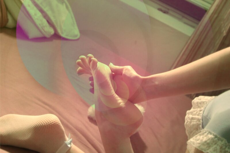 foot massage on bed