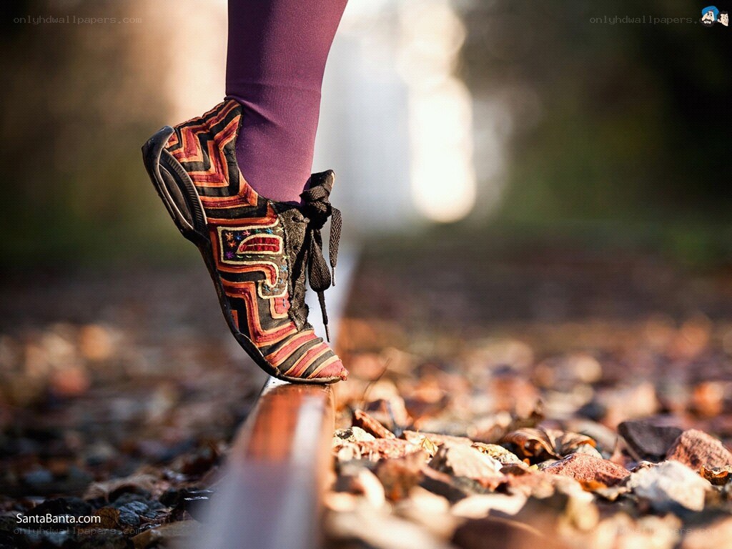 foot on a railway track