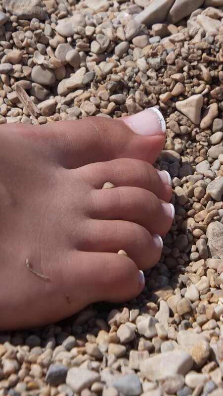 Foot on Pebbles