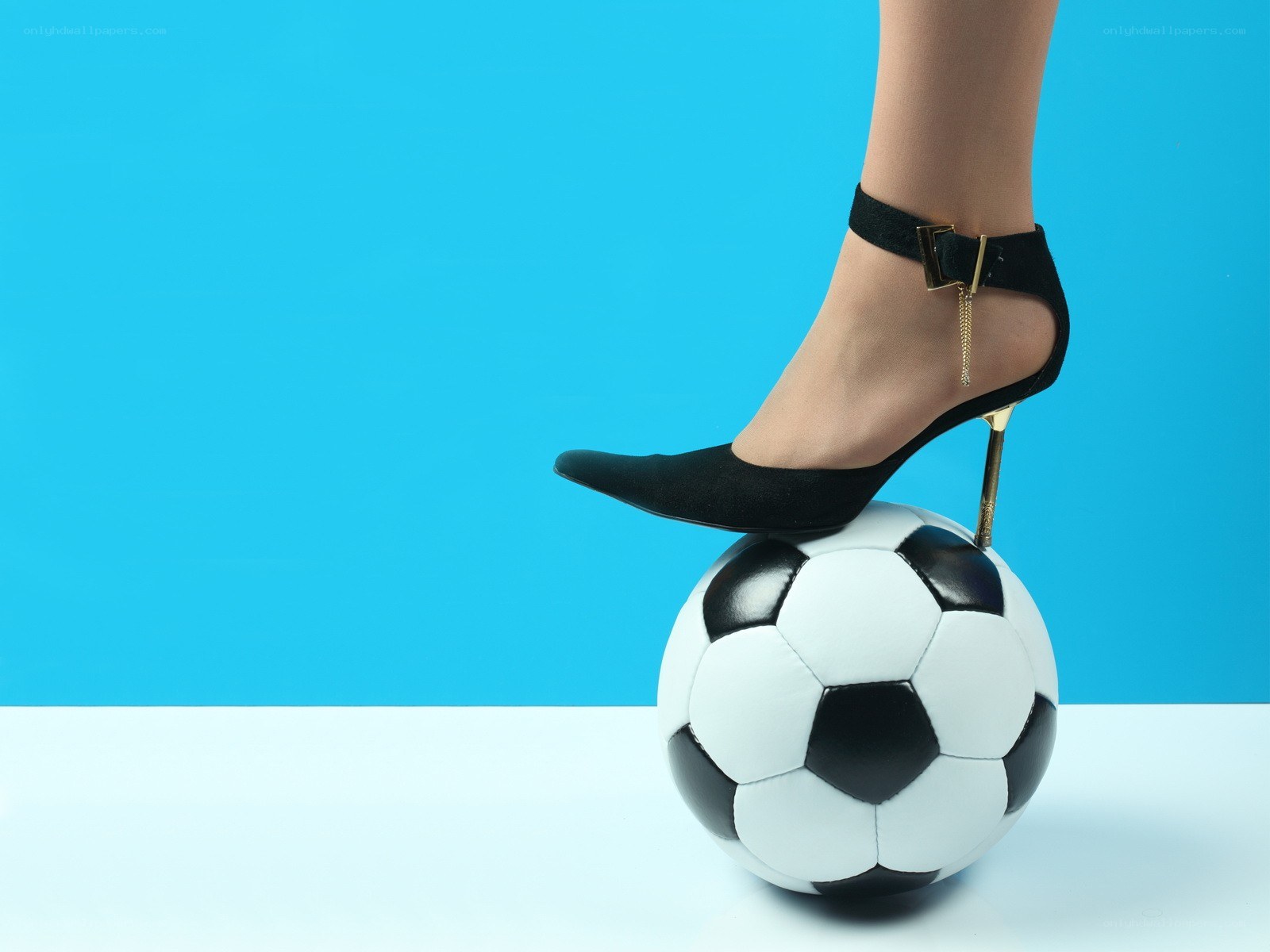 foot on soccer ball