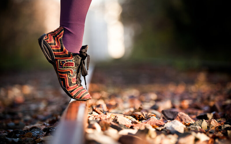 Foot on Train Track — Brown, Serene