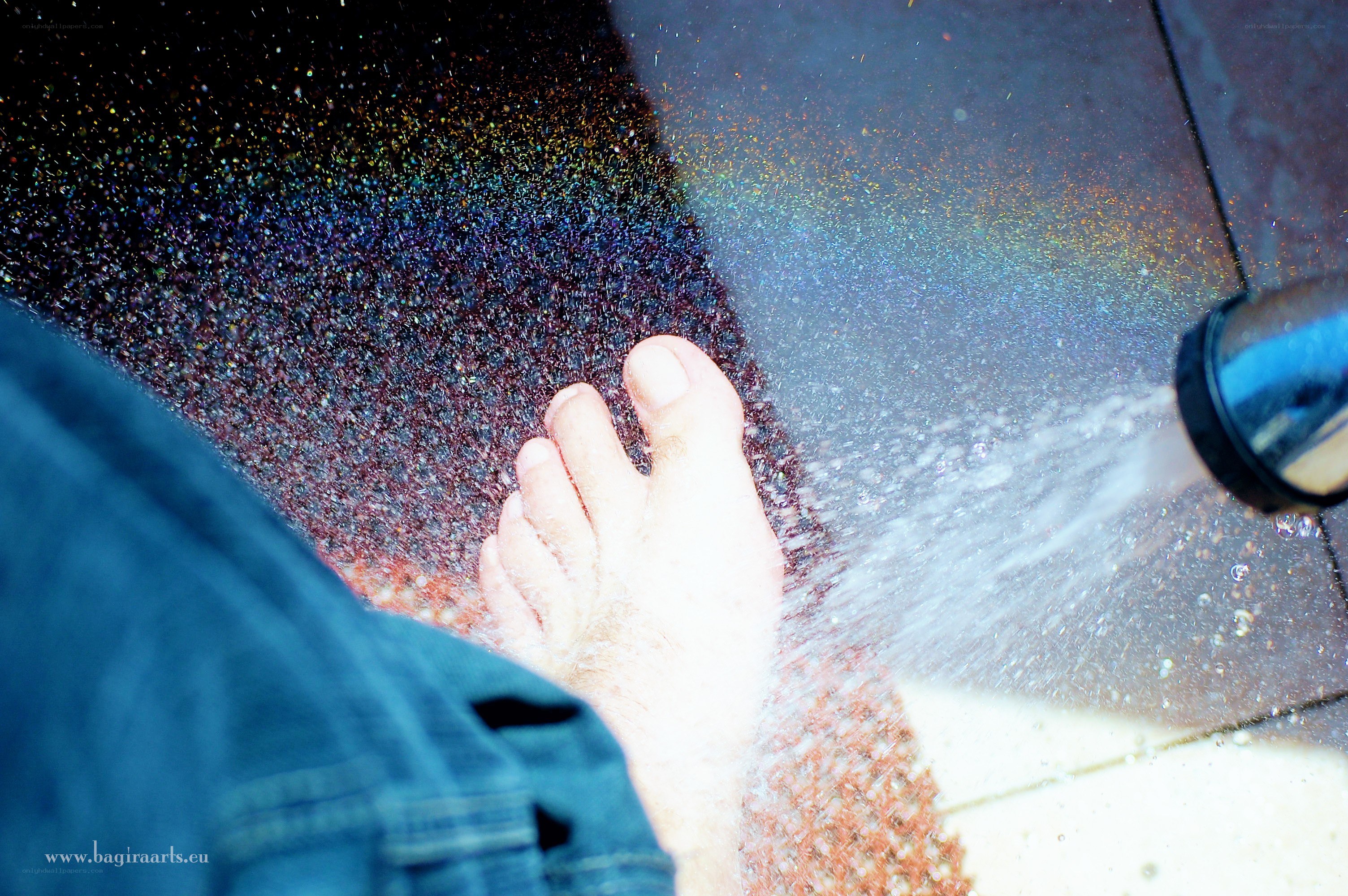 foot under water spray