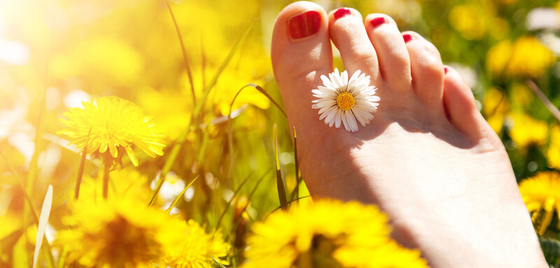 Foot with Daisy Flower