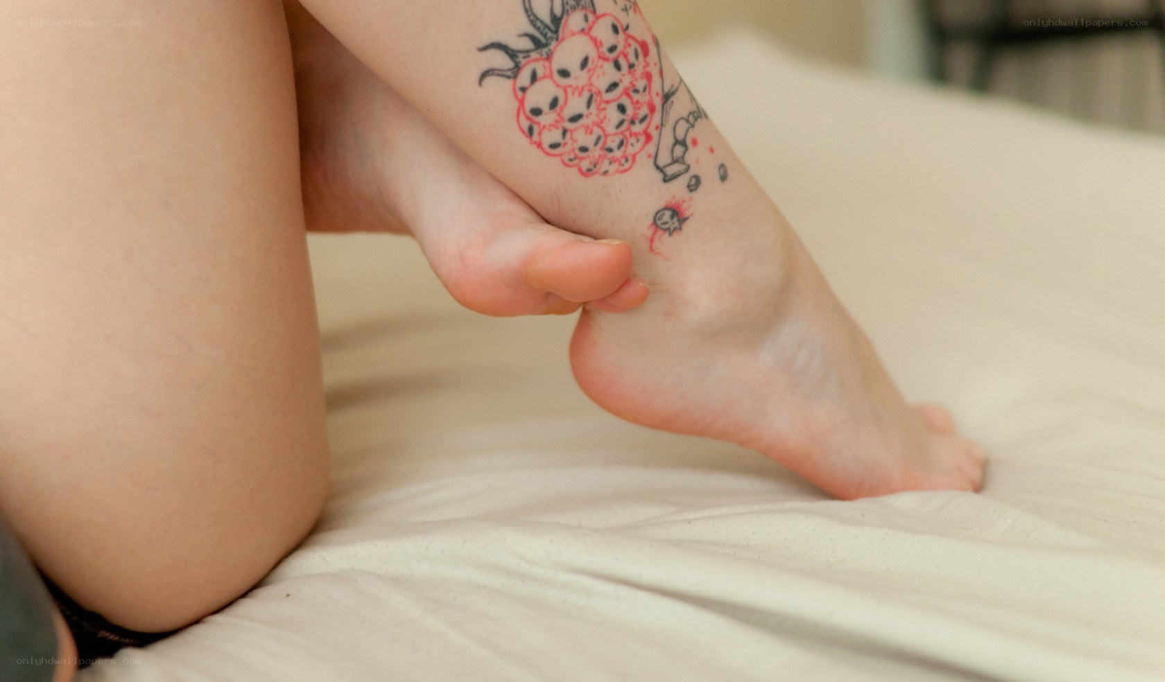 foot with tattoo on ankle