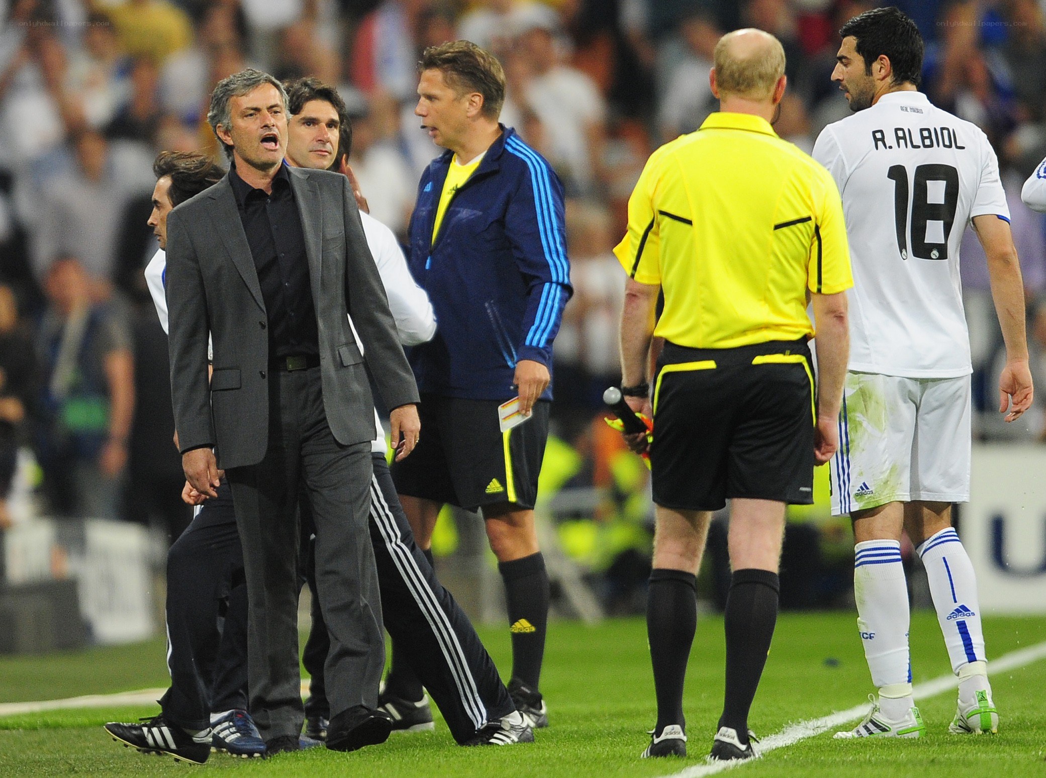 Football coach arguing with referee