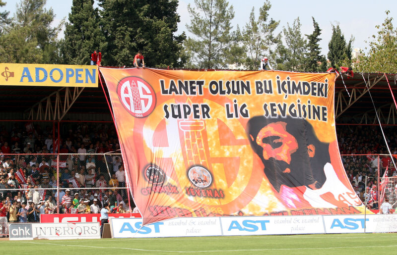 Football fans display large banner