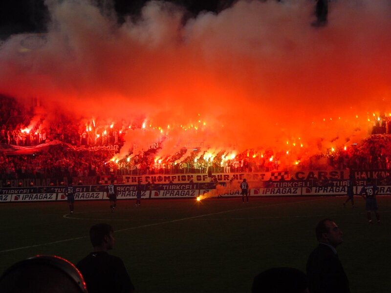 Football fans with flares
