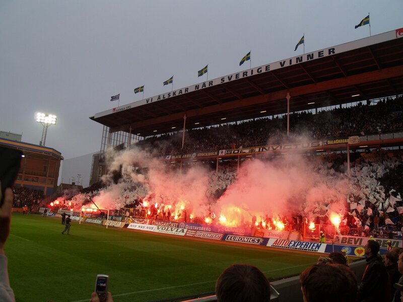 Football fans with flares