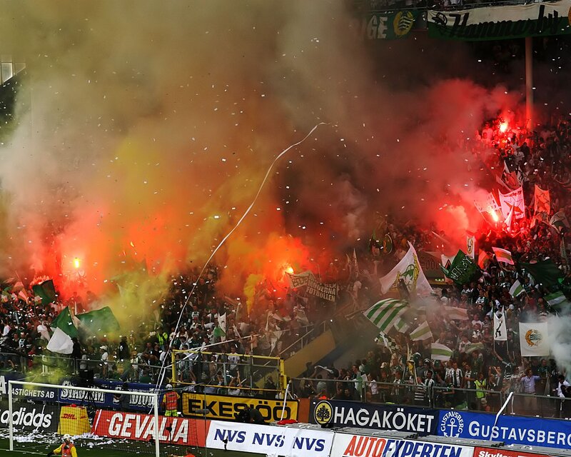 Football fans with flares
