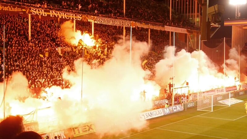Football fans with flares