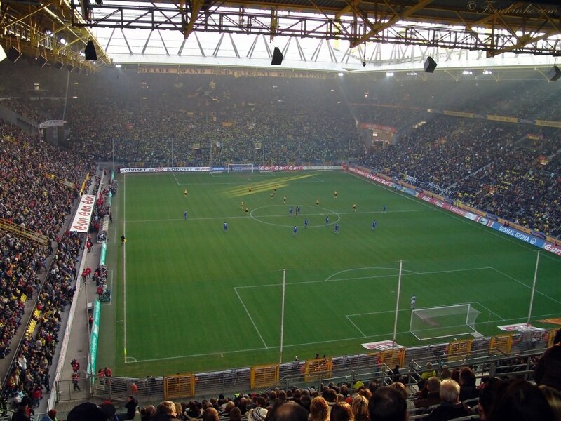 Football match in a packed stadium