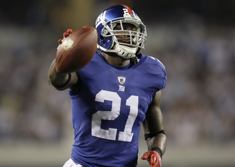 Football player catching ball