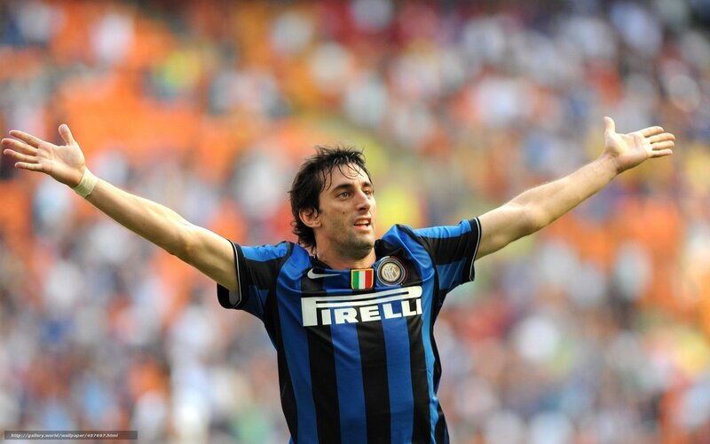 Football Player Celebrating — Blue, Celebratory, Afternoon, Photograph