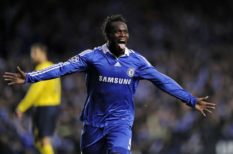 Football Player Celebrating — Blue, Celebratory, Night, Photograph