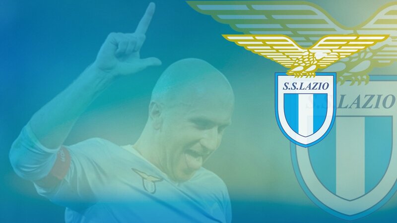 Football Player Celebrating — Blue, Celebratory, Photograph, Logo