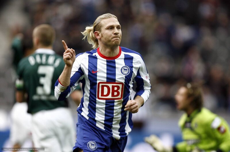 football player celebrating goal