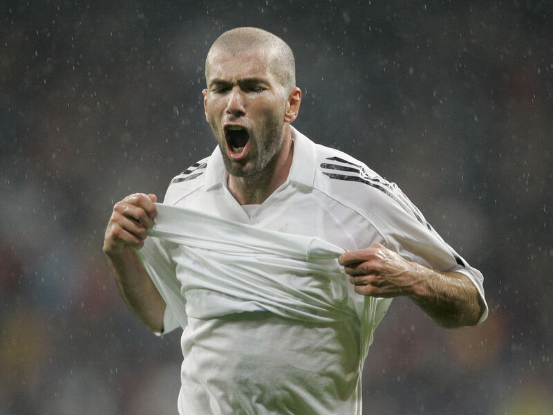 football player celebrating in rain