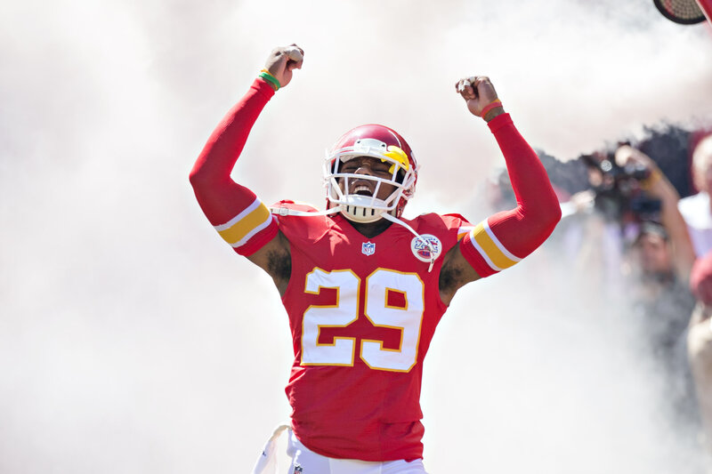 Football Player Celebrating — Red, Dramatic, Afternoon