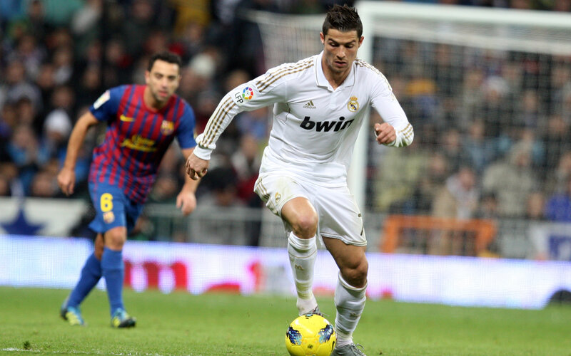 Football Player Dribbling Ball — White
