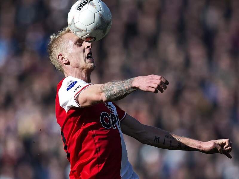 Football Player Heading Ball — Red