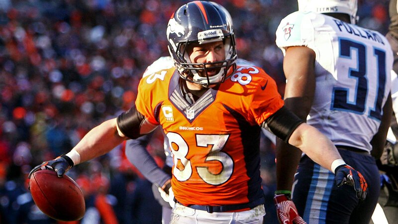 Football Player Holding Ball — Orange, Intense