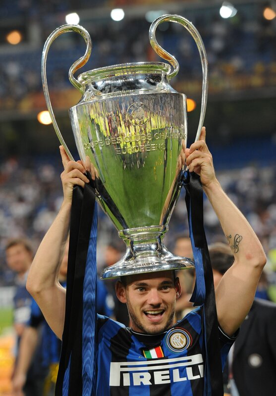 Football player holding trophy