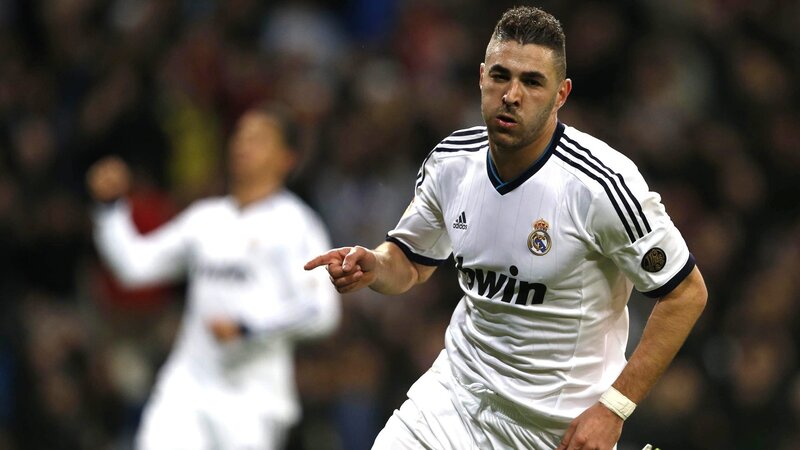 Football Player in Action — White, Intense, Night