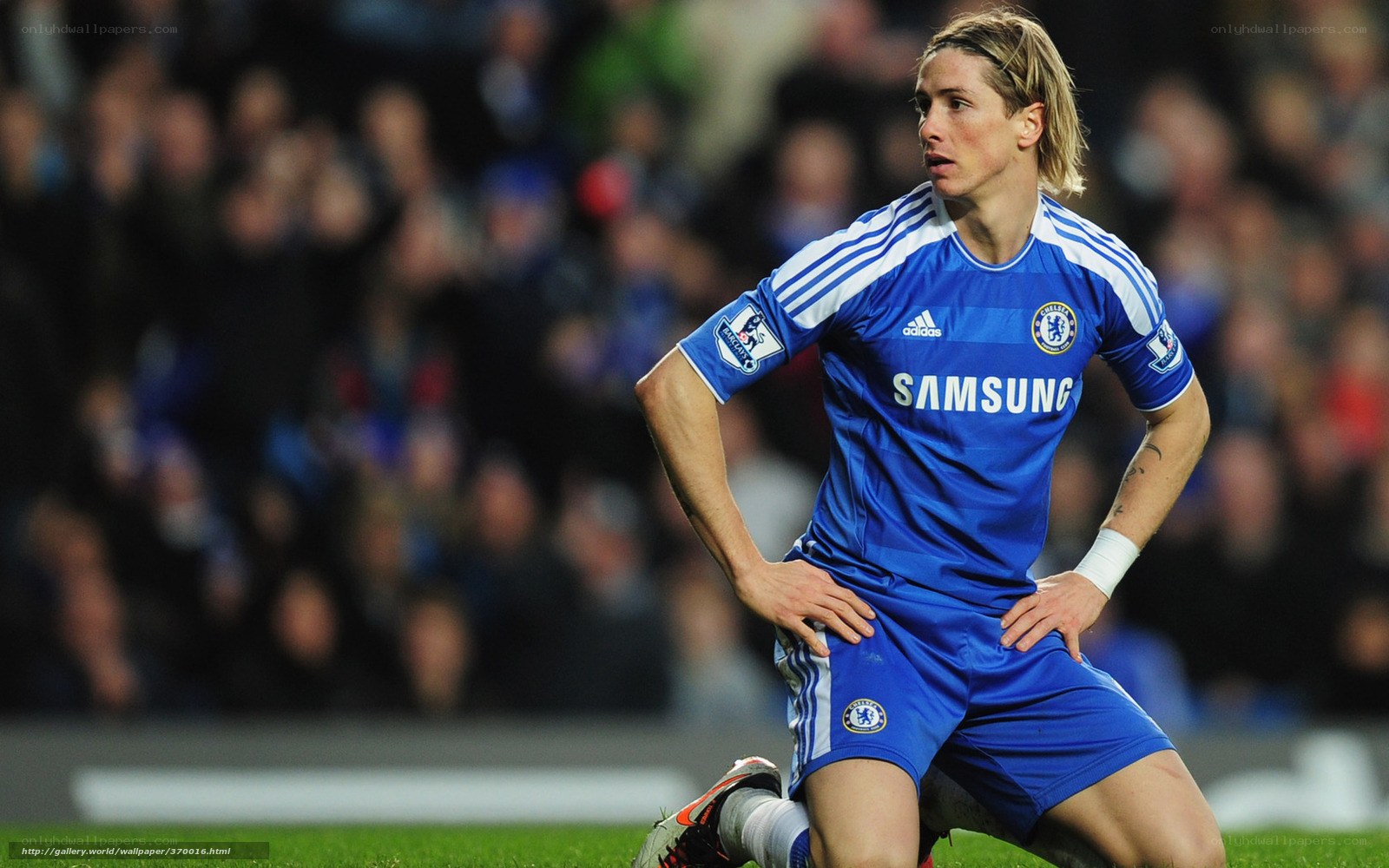 football player in blue kit
