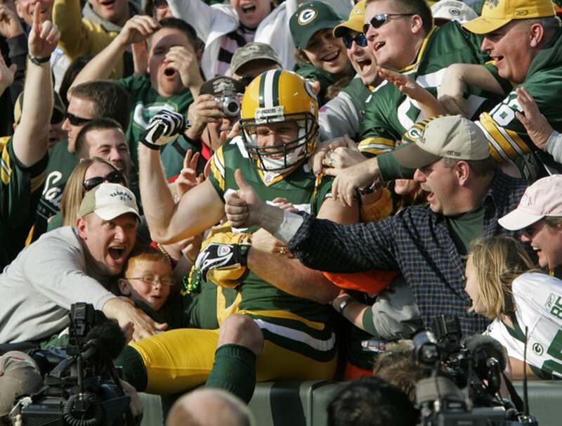 Football Player in Crowd — Green
