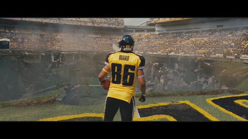 football player in destroyed stadium