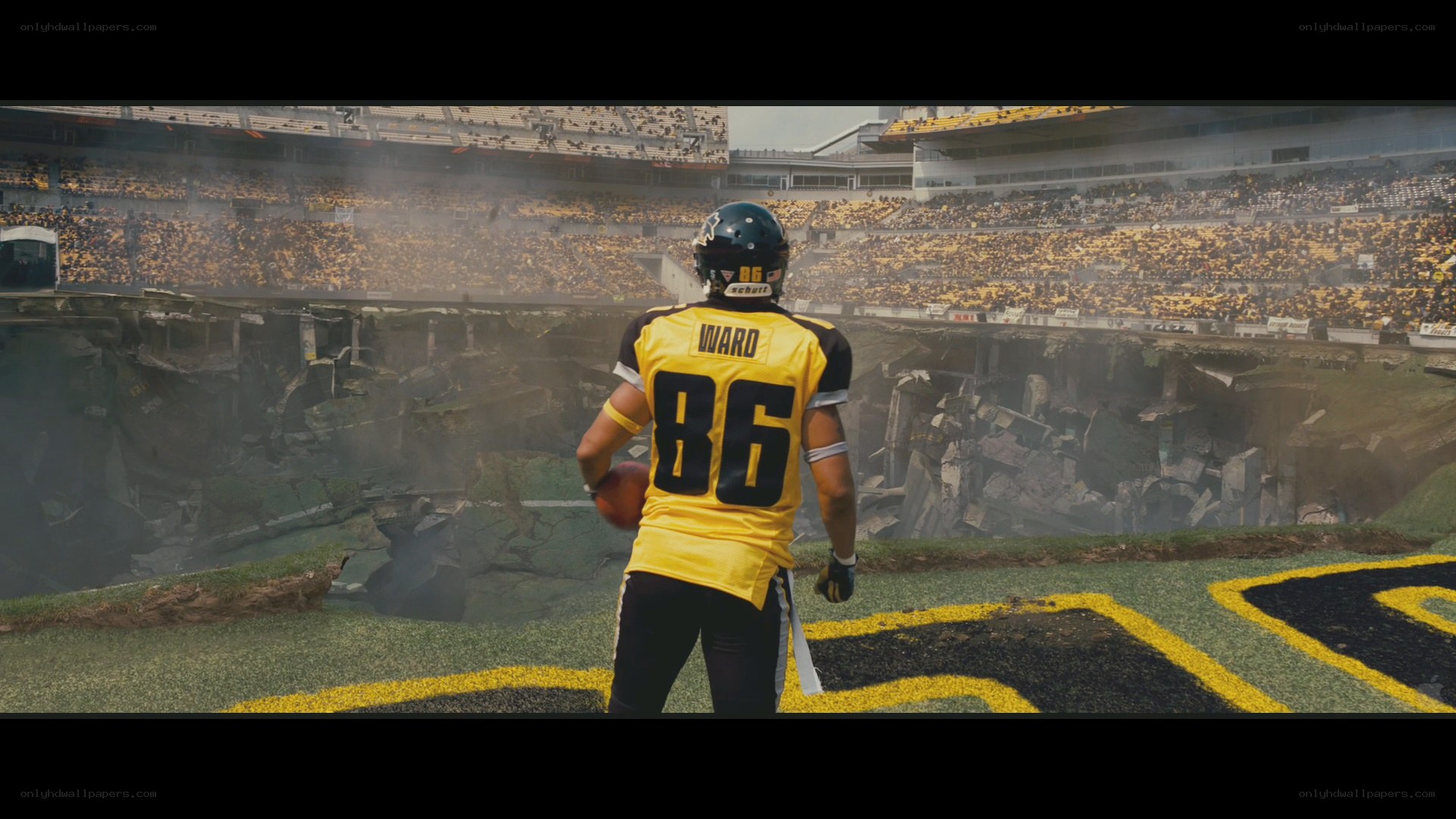 football player in destroyed stadium