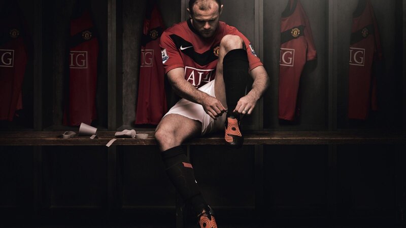 Football Player in Locker Room — Red, Dramatic, Photograph