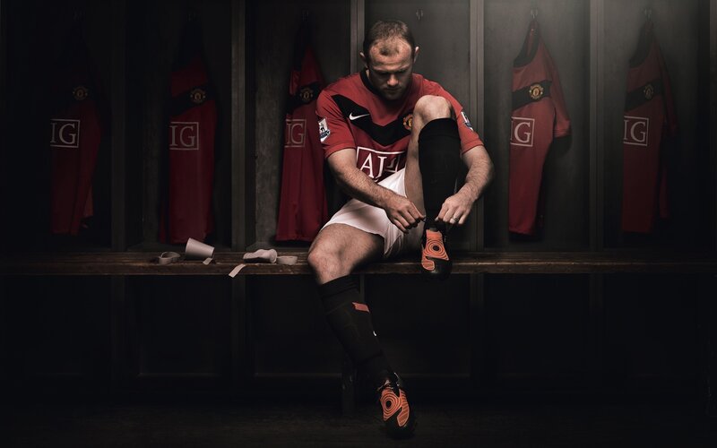 Football Player in Locker Room — Red, Dramatic