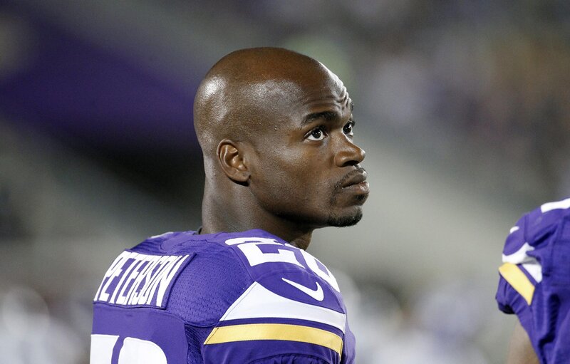 football player in purple uniform