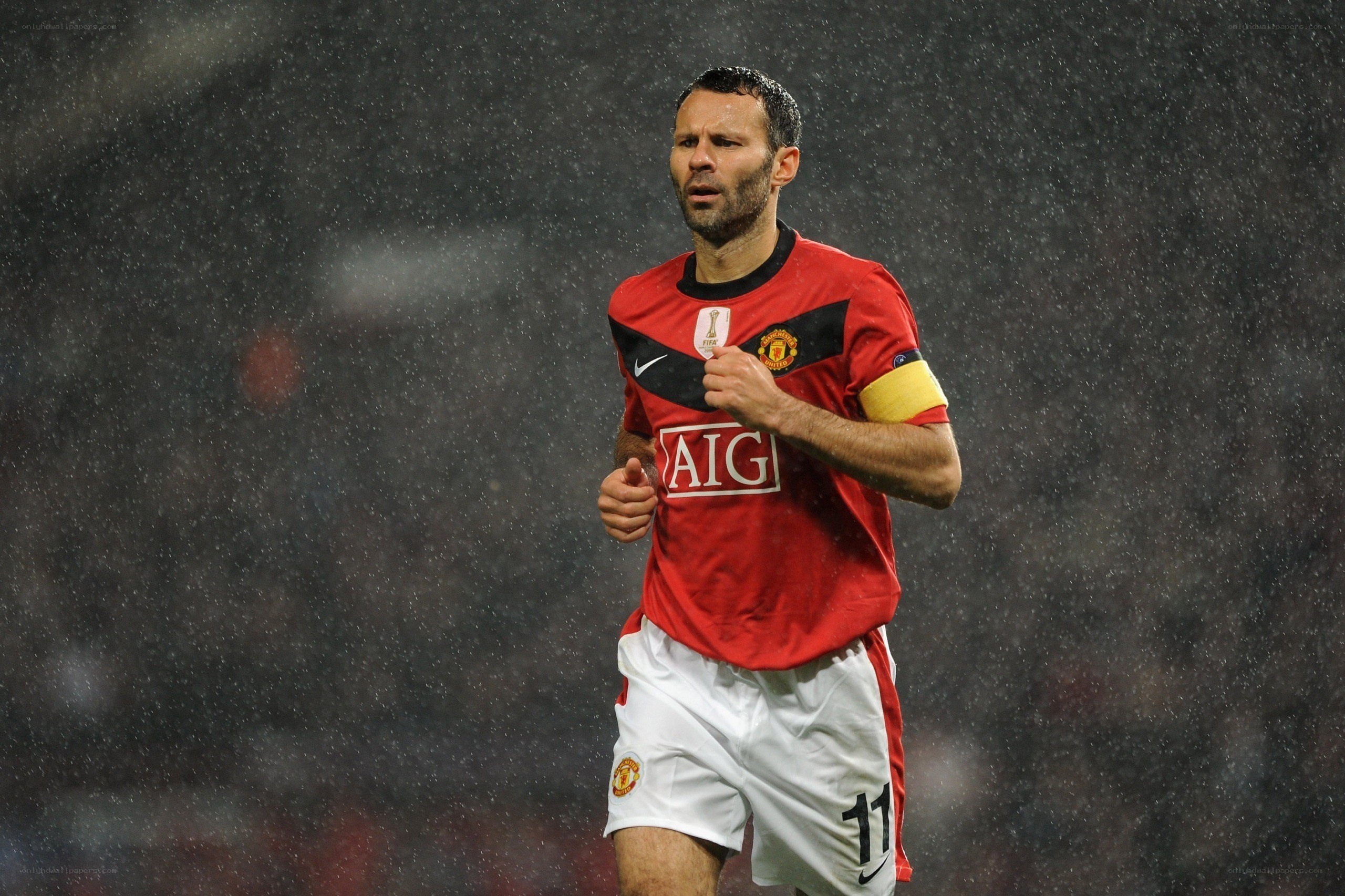 football player in rain
