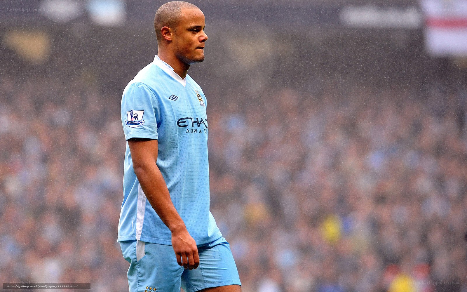 football player in rain