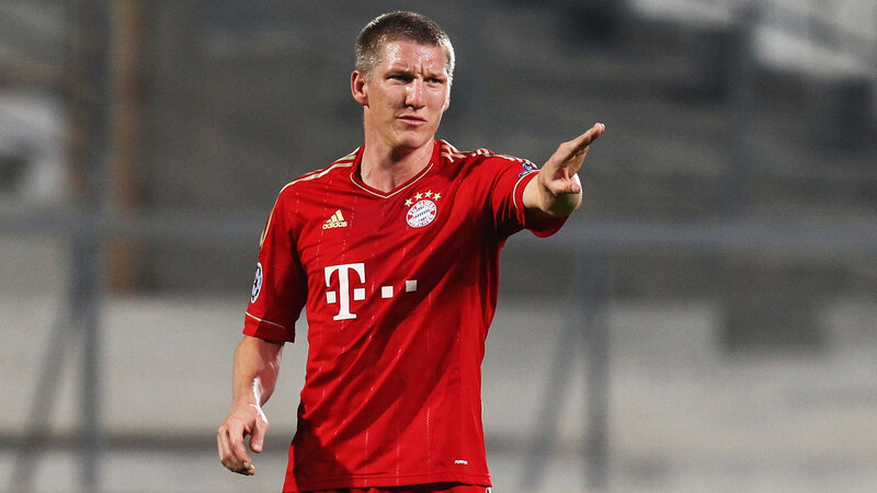 Football Player in Red Jersey — Focused, Night